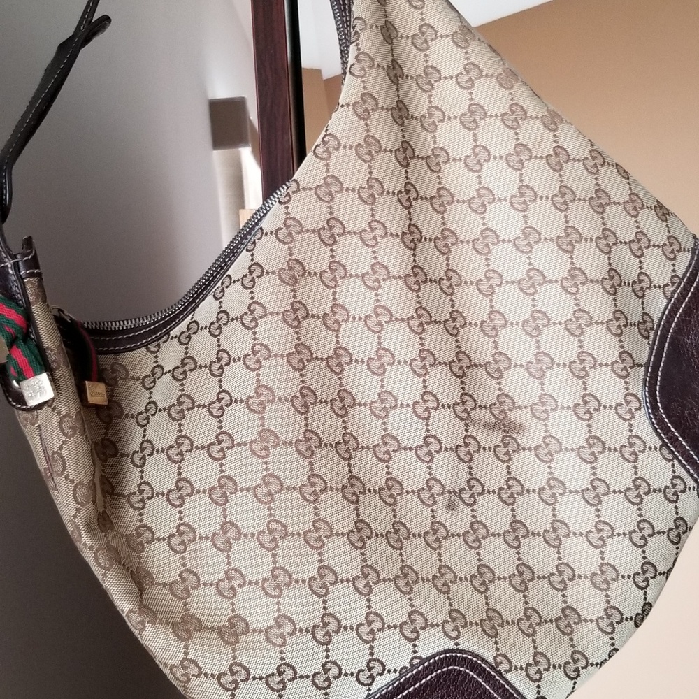 Brown leather strap canvas Gucci bag